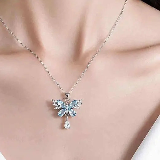 silver butterfly necklace set with lake blue and white CZ for everyday romance by Butterfly Aura