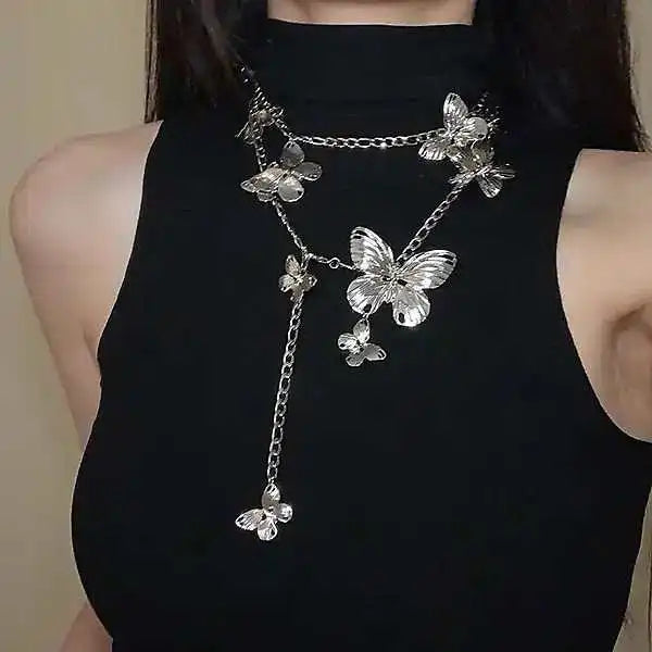 A vintage butterfly layering necklace that doubles as a waist chain for women who love bold statement jewelry with an antique soul