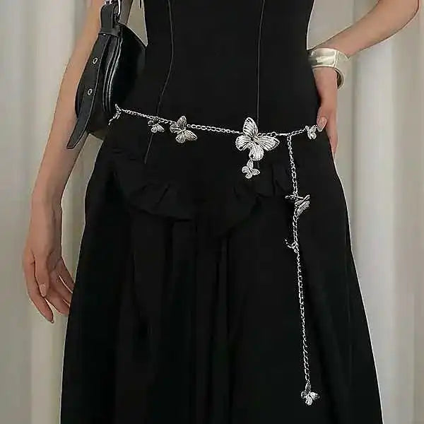 A vintage butterfly layering necklace that doubles as a waist chain for women who love bold statement jewelry with an antique soul